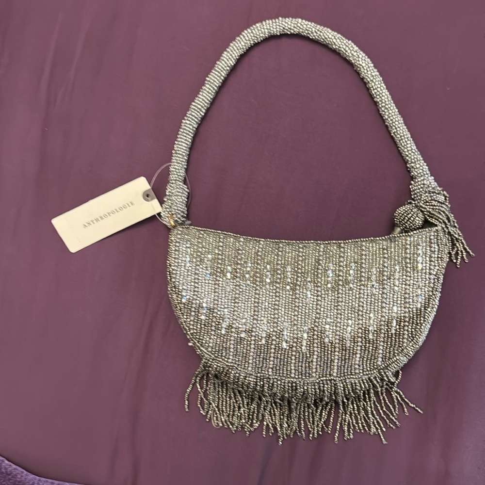 Anthropologie mini sparkle fringe crescent purse